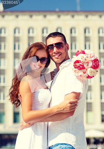 Image of smiling couple in city