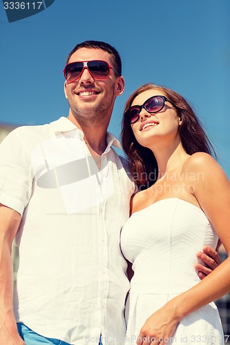 Image of smiling couple in city