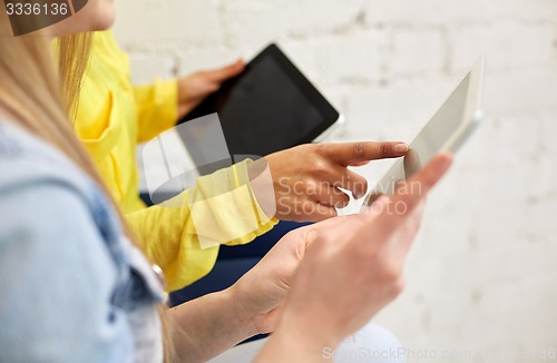 Image of close up of students with tablet pc at school