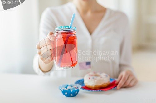 Image of woman celebrating american independence day