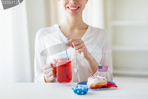 Image of happy woman celebrating american independence day