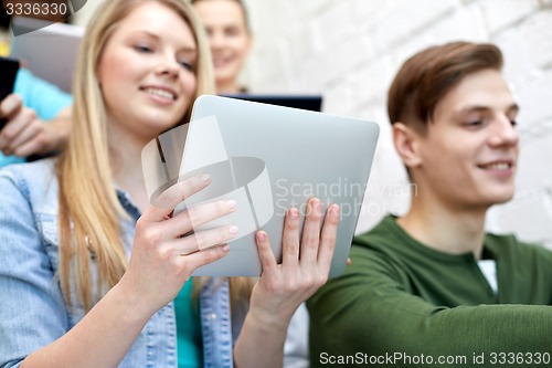 Image of close up of students with tablet pc at school