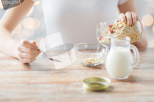 Image of close up of woman eating muesli for breakfast