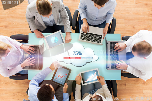 Image of business team with computers cloud computing