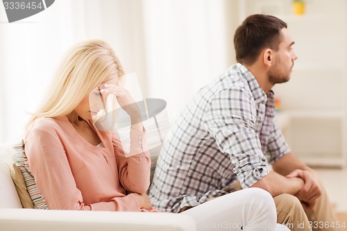 Image of unhappy couple having argument at home