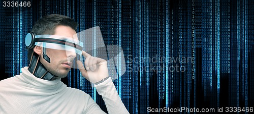 Image of man with futuristic glasses and sensors