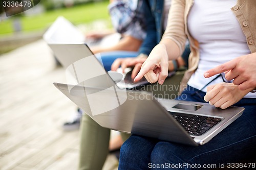 Image of close up of students or teenagers with laptop
