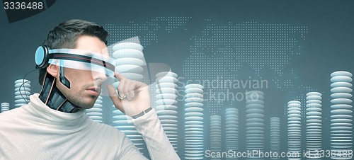 Image of man with futuristic 3d glasses and sensors