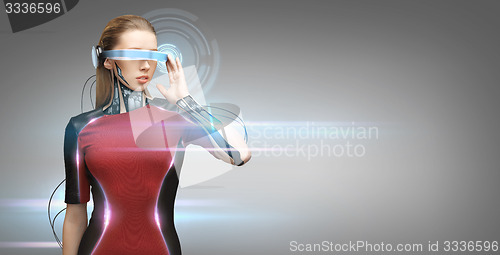 Image of woman with futuristic glasses and sensors