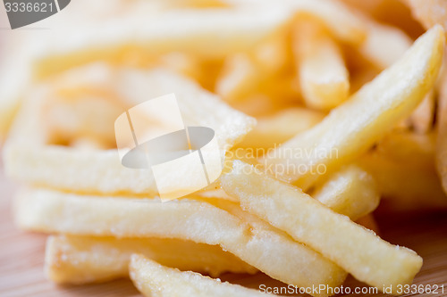 Image of close up of french fries on table