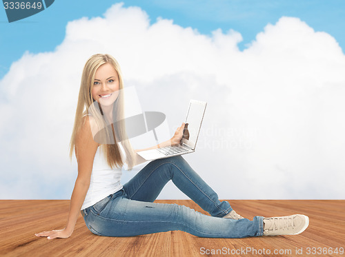 Image of happy student girl with laptop computer