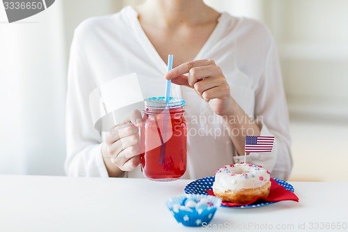 Image of woman celebrating american independence day