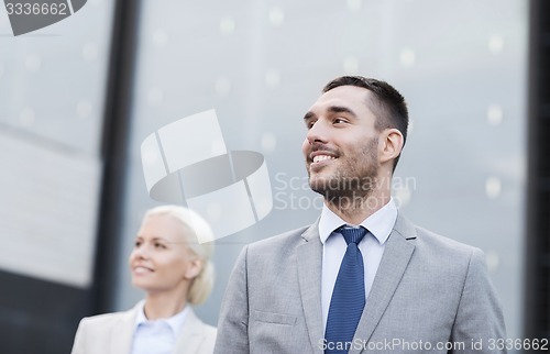 Image of close up of smiling businessmen