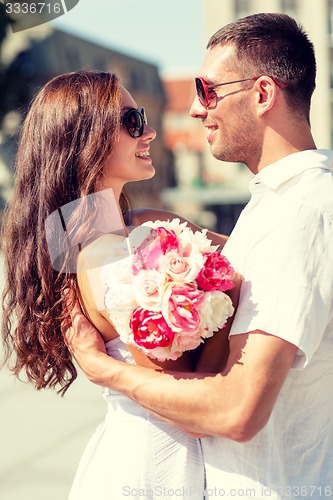 Image of smiling couple in city