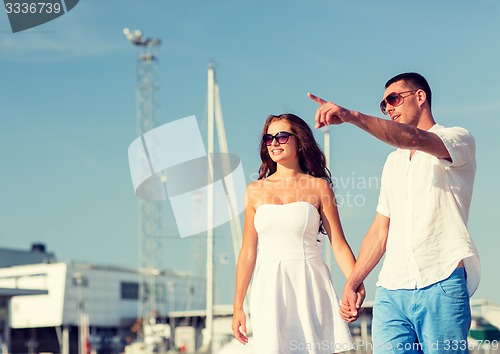 Image of smiling couple in city