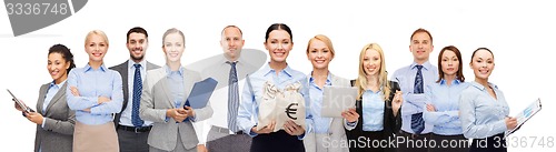 Image of group of happy businesspeople with money bags