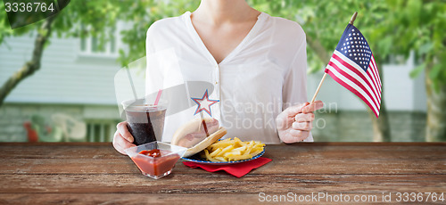 Image of woman celebrating american independence day