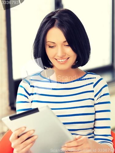 Image of happy teenage girl with tablet pc computer