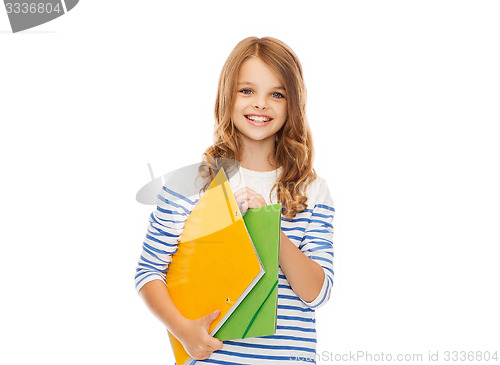 Image of child holding colorful folders