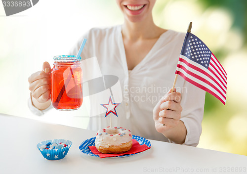 Image of happy woman celebrating american independence day