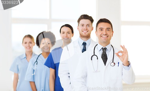 Image of group of happy doctors at hospital