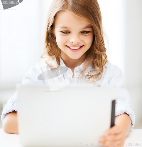 Image of girl with tablet pc at school