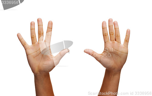 Image of two woman hands waving hands