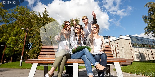 Image of group of students or teenagers showing thumbs up