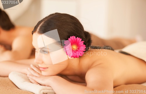 Image of woman in spa with hot stones