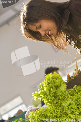 Image of Woman buying salad