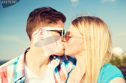 Image of smiling couple outdoors