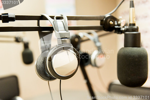 Image of headphones at recording studio or radio station
