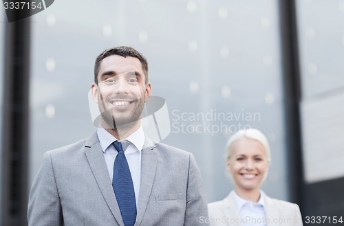 Image of close up of smiling businessmen