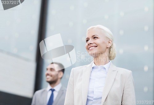 Image of close up of smiling businessmen