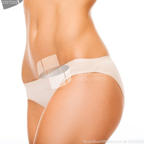 Image of woman in cotton underwear showing slimming concept