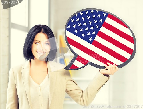 Image of smiling woman with text bubble of american flag