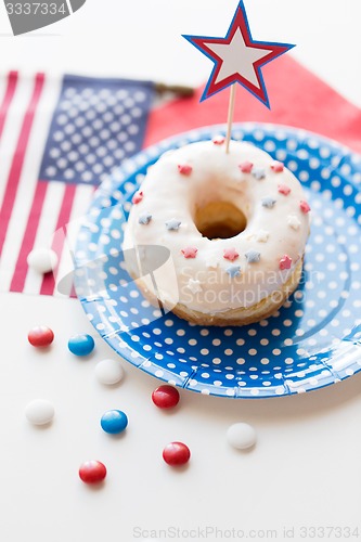 Image of donut with star decoration on independence day