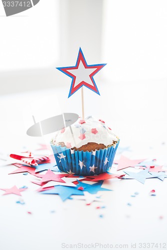Image of cupcake with star on american independence day