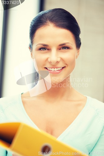 Image of woman with folder