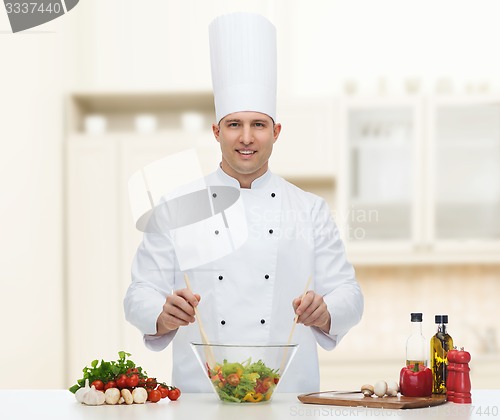 Image of happy male chef cook cooking food