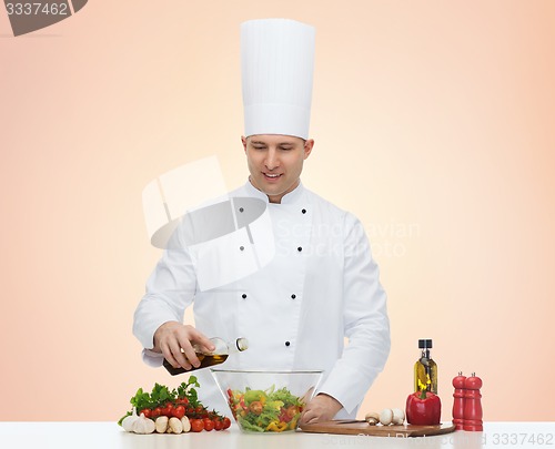 Image of happy male chef cook cooking food