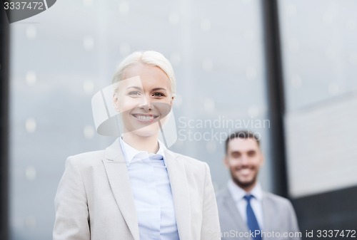 Image of close up of smiling businessmen