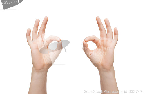 Image of man hands showing ok sign