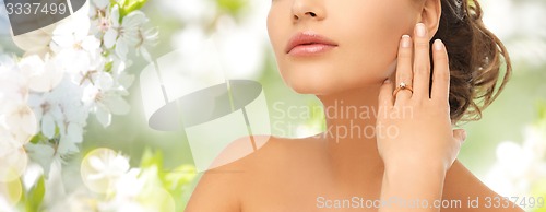 Image of beautiful woman with diamond engagement ring