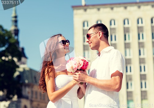 Image of smiling couple in city