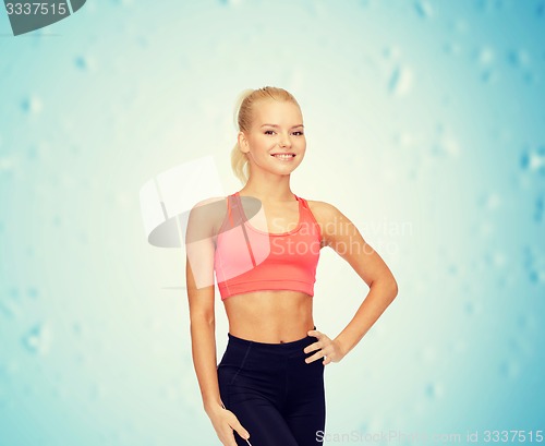 Image of beautiful athletic woman in sportswear