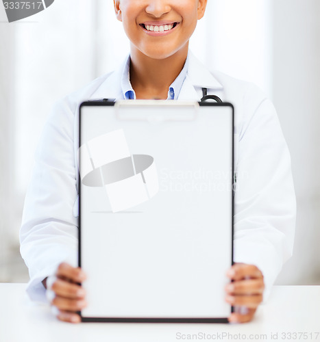 Image of doctor with blank prescription