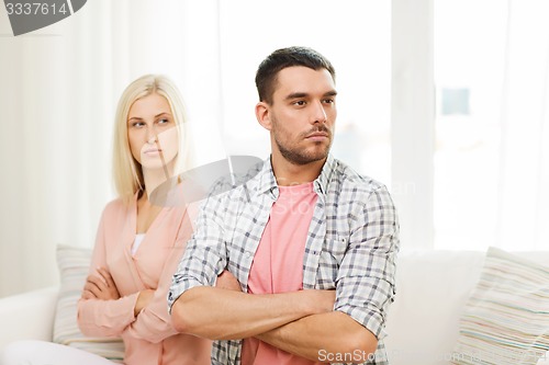 Image of unhappy couple having argument at home