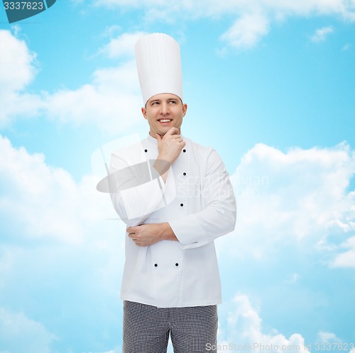 Image of happy male chef cook thinking