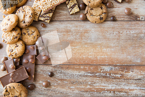 Image of close up of candies, chocolate, muesli and cookies